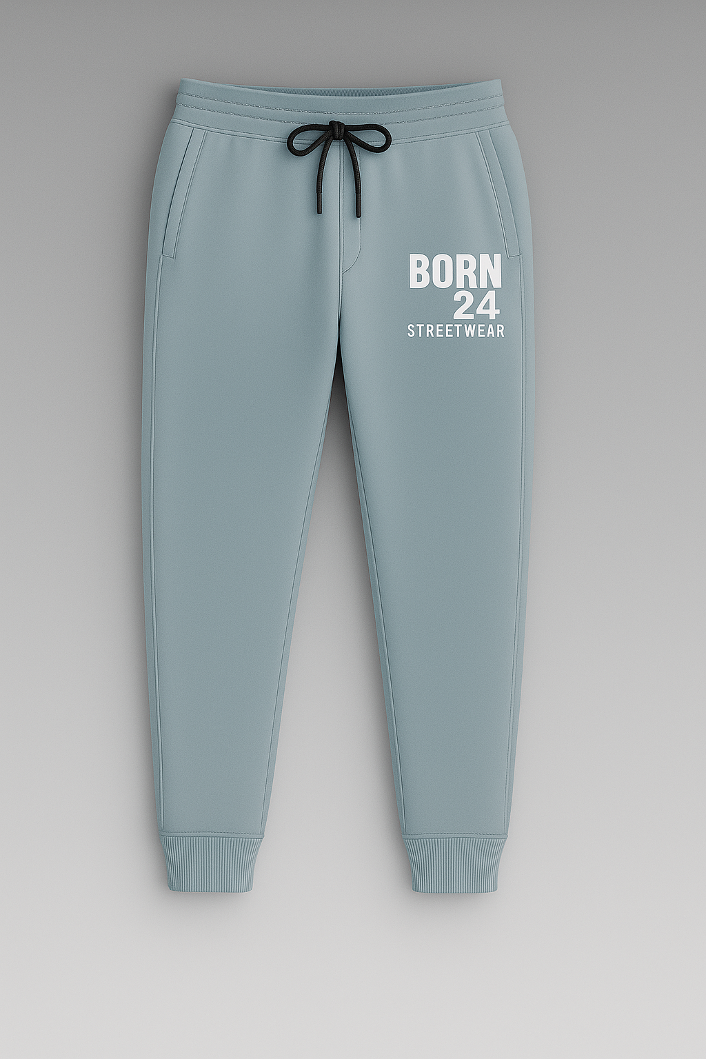 Light blue jogger pants with 'BORN 24 STREETWEAR' text on a gray background